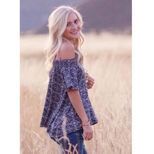 Off the shoulder Maurice’s top